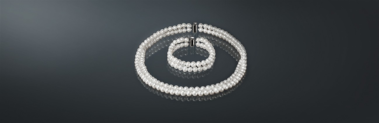 Гарнитур из пресноводного жемчуга: ожерелье (б075-бдв) и браслет (б075-20бдв). б075-4020бдв